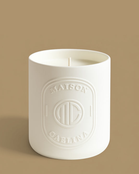 Palo santo sandalwood luxury soy wax candle in white ceramic vessel by Maison Caelina