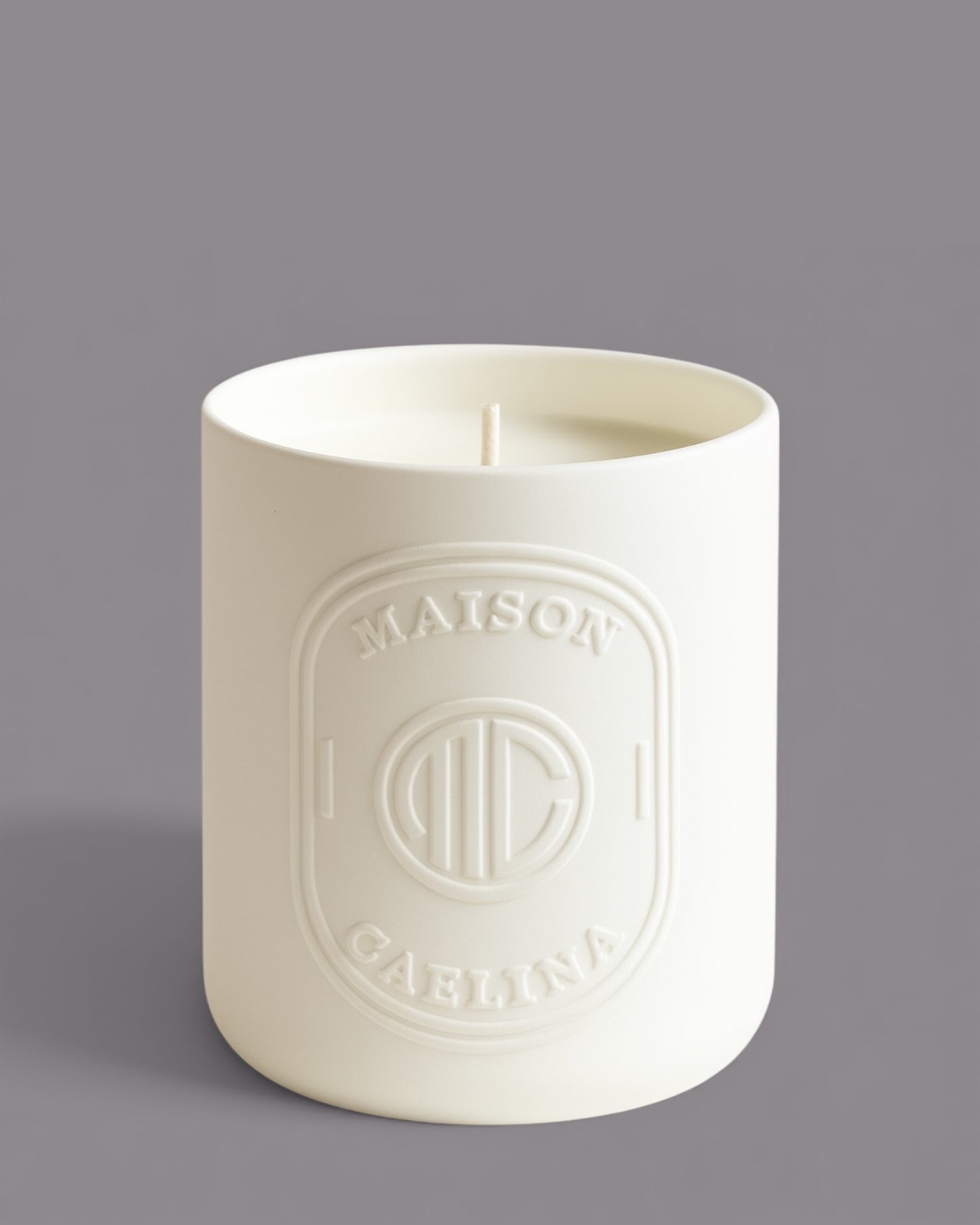 Heritage herbal soy wax candle in white ceramic vessel by Maison Caelina